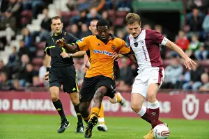 Hearts Prints: Mujanji Bia vs Zaliukas: Wolverhampton Wanderers vs Heart of Midlothian Pre-Season Clash