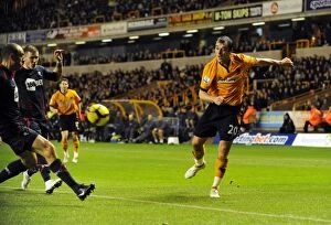 Images Dated 5th December 2009: Nenad Milijas Dramatic Cross: A Potential Goal in Wolverhampton Wanderers vs Bolton Wanderers