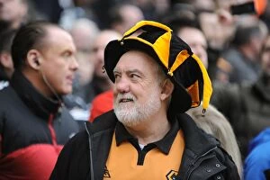 Images Dated 21st February 2011: A Passionate Wolverhampton Wanderers Fan at the Barclays Premier League Match Against West