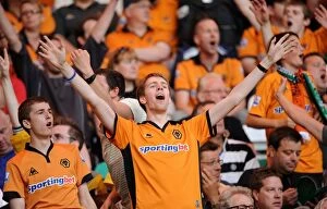 Celtic v Wolves Collection: Passionate Wolves: Wolverhampton Wanderers Fans Showing Their Support Against Celtic in Pre-Season