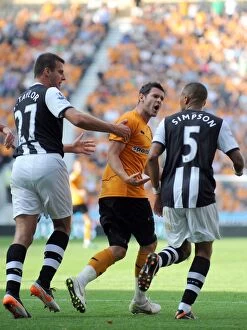Wolves v Newcastle Collection: Penalty Dispute: Matthew Jarvis vs. Danny Simpson - Wolverhampton Wanderers vs. Newcastle United