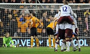 Images Dated 21st January 2012: Robbie Keane's Double Strike: Thrilling Rivalry - Wolverhampton Wanderers vs