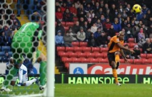 Images Dated 4th December 2010: Ronald Zubar's Thunderous Header Hits the Crossbar: Wolverhampton Wanderers vs