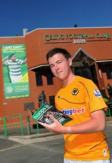 Celtic Prints: A Sea of Passionate Wolverhampton Wanderers Fans at Celtic Park