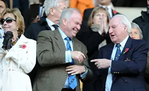 Framed Print : Sir Jack Hayward and Jonathan Hayward: A Father-Son Moment of Laughter at Wolves vs. Wigan Athletic in the Premier League Framed Print : Sir Jack Hayward and Jonathan Hayward: A Father-Son Moment of Laughter at Wolves vs. Wigan Athletic in the Premier League