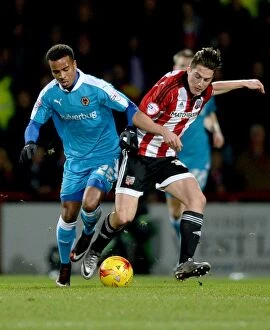 Images Dated 23rd February 2016: Sky Bet Championship Showdown: Wolverhampton Wanderers vs. Brentford at Griffin Park