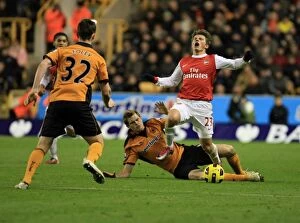 Images Dated 10th November 2010: Stearman vs. Arshavin: A Premier League Showdown between Wolverhampton Wanderers and Arsenal