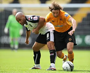 Framed Print : Stephen Hunt vs. Karl Hawley: A Fierce Pre-Season Rivalry - Notts County vs. Wolverhampton Wanderers Framed Print : Stephen Hunt vs. Karl Hawley: A Fierce Pre-Season Rivalry - Notts County vs. Wolverhampton Wanderers