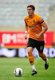 Images Dated 21st August 2011: Stephen Ward in Action: Wolverhampton Wanderers vs Fulham - Premier League Soccer