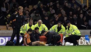 Images Dated 10th November 2010: Stephen Ward Suffers Gashed Shin from Cesc Fabregas Challenge: Wolves vs Arsenal (Premier League)