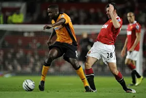Man United V Wolves (Cup) Prints: Sylvan Ebanks-Blake vs Darron Gibson: A Clash in the Carling Cup: Manchester United vs Wolverhampton Wanderers