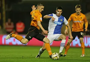 Season 2012-13 Prints: Tense Moment: Jake Cassidy's Goal Attempt Thwarted by Scott Dann (Wolverhampton Wanderers vs)