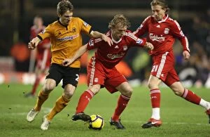 Wolves v Liverpool Collection: Titanic Clash: Doyle vs Kuyt - Wolverhampton Wanderers vs Liverpool
