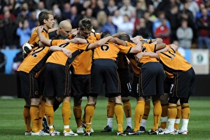 Wolves V Aston Villa Prints: United in Focus: Wolves Players Pre-Match Huddle vs. Aston Villa (Premier League)