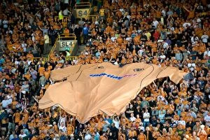 Images Dated 15th August 2009: Uniting the Molineux Crowd: A Gigantic Wolverhampton Wanderers Team Shirt Parade Before the Wolves
