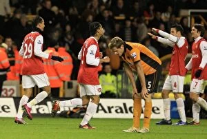 Images Dated 10th November 2010: Wolverhampton Wanderers 0-2 Arsenal: Dejected Stearman Amid Chamakh's Celebration