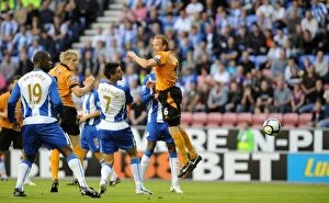 Wigan Athletic Vs Wolves Collection: Wolverhampton Wanderers Andrew Keogh Scores the Opener Against Wigan Athletic in BPL (August 18)