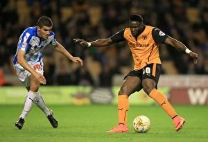 Sky Bet Championship - Wolves v Huddersfield Town - Molineux Collection: Wolverhampton Wanderers: Bakary Sako Scores Breathtaking Goal Past Conor Coady in Sky Bet