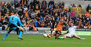 Sky Bet Championship - Wolves v Huddersfield Town - Molineux Collection: Wolverhampton Wanderers Benik Afobe Scores Third Goal Against Huddersfield Town in Sky Bet