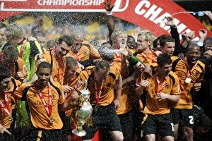 Championship Champions Celebration Collection: Wolverhampton Wanderers: Championship Promotion Celebration with Trophy (vs Doncaster Rovers)