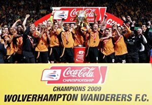 Championship Champions Celebration Collection: Wolverhampton Wanderers: Championship Title Win - Celebrating with the Trophy