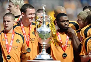 Wolverhampton Wanderers: Championship Title Win - Celebrating Promotion with the Trophy (Molineux, 2008-09)
