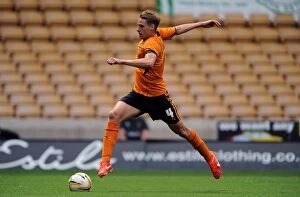 Friendly : Wolves v Real Betis - Molineaux : 27-07-2013 Collection: Wolverhampton Wanderers David Edwards Faces Off Against Real Betis in Pre-Season Friendly at