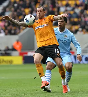 Wolverhampton Wanderers Fletcher Stands Firm Against Manchester City: A Battle for the Ball