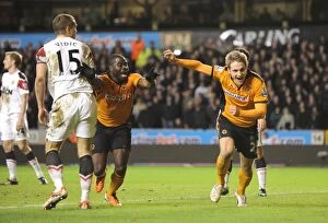 Images Dated 5th February 2011: Wolverhampton Wanderers Glory Moment: Kevin Doyle and George Elokobi's Euphoric Celebration After