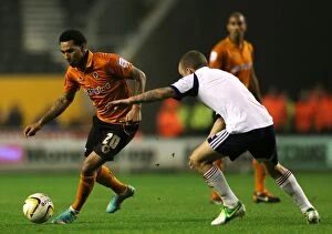 Images Dated 23rd October 2012: Wolverhampton Wanderers: Jermaine Pennant Outwits Jay Spearing in Championship Clash at Molineux