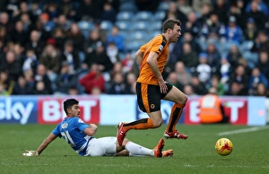 Sky Bet Championship Prints: Wolverhampton Wanderers Kevin McDonald Outmaneuvers QPR's Massimo Luongo in Sky Bet Championship Match