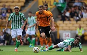 Friendly : Wolves v Real Betis - Molineaux : 27-07-2013 Collection: Wolverhampton Wanderers Lee Evans in Action Against Real Betis (2013)