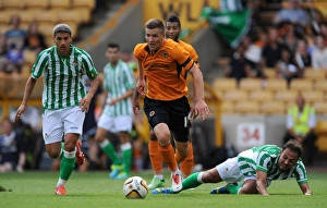 Framed Print : Wolverhampton Wanderers Lee Evans in Action Against Real Betis (2013) Framed Print : Wolverhampton Wanderers Lee Evans in Action Against Real Betis (2013)
