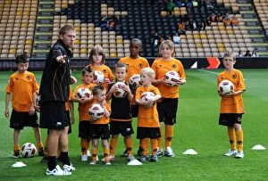 Wolves v Real Zaragoza Collection: Wolverhampton Wanderers: Matchday Mascots Prepare for Action Ahead of Wolves vs. Real Zaragoza