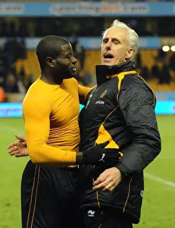 George Elokobi Prints: Wolverhampton Wanderers: Mick McCarthy and George Elokobi's Emotional Reunion After Premier League Victory