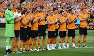Images Dated 21st August 2011: Wolverhampton Wanderers Pay Tribute: Minutes Applause for Late Frank Munro during Wolves v Fulham