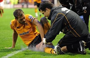 Images Dated 19th July 2011: Wolverhampton Wanderers Roger Johnson Suffers Injury in Pre-Season Friendly Against Walsall