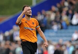 Images Dated 13th August 2011: Wolverhampton Wanderers: Roger Johnson's Euphoric Full-Time Celebration vs