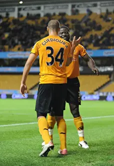 Framed Print : Wolverhampton Wanderers Triumph: Elokobi and Guedioura's Goals Secure 3-0 Carling Cup Victory over Millwall