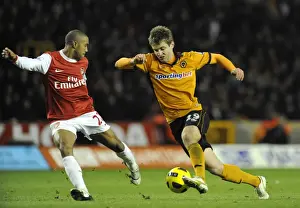 Kevin Doyle Prints: Wolverhampton Wanderers vs Arsenal: Intense Encounter between Kevin Doyle and Gael Clichy in the Premier League