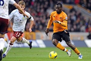 Images Dated 21st January 2012: Wolverhampton Wanderers vs Aston Villa: Emmanuel Frimpong Faces Off in Premier League Showdown
