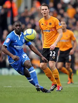 Wolverhampton Wanderers vs. Birmingham City: A FA Cup Battle - Eggert Jonsson vs. Morgaro Gomis