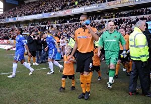 Images Dated 20th February 2010: Wolverhampton Wanderers vs. Chelsea: A Mascot Showdown - The Epic Battle of Wolves