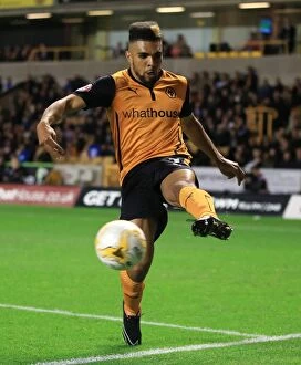 Sky Bet Championship - Wolves v Huddersfield Town - Molineux Collection: Wolverhampton Wanderers vs Huddersfield Town: Scott Golbourne's Action-Packed Performance at