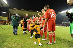 Wolves V Liverpool Prints: Wolverhampton Wanderers vs. Liverpool: A Mascot Showdown - Premier League Battle