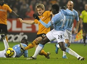 Images Dated 28th December 2009: Wolverhampton Wanderers vs Manchester City: A Premier League Battle - Doyle vs Toure