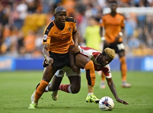 Wolverhampton Wanderers vs Newport County: Battle for the Ball in Capital One Cup First Round