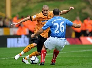 Wolves vs Portsmouth Collection: Wolverhampton Wanderers vs Portsmouth: A Premier League Showdown - Michael Kightly vs Tal Ben Haim