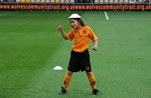 Wolves V Real Zaragoza Prints: Wolverhampton Wanderers vs Real Zaragoza: A Mascot Showdown - The Clash of Wolves and Zaragoza Mascots