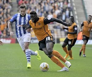 Sky Bet Championship - Wolves v Wigan Athletic - Molineux Collection: Wolverhampton Wanderers vs Wigan Athletic: A Championship Showdown - Sako vs Cowie's Intense
